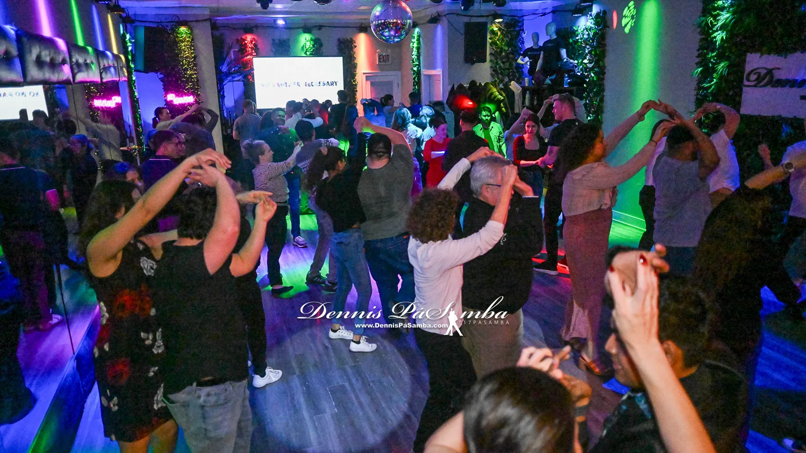 Students turning during a cumbia class at Dennis PaSamba Dance Company in Chicago